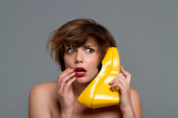 Woman gossiping on the phone