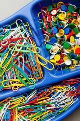 Various colourful office supplies in the holder