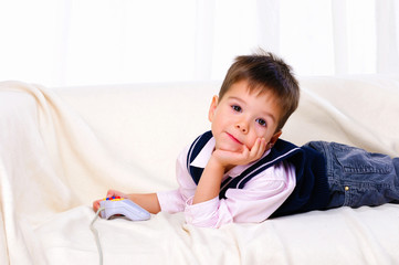 Little boy playing video games