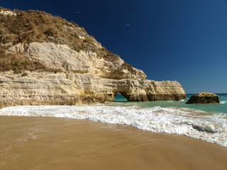 the idyllic Praia de Rocha beach on  Algarve region.