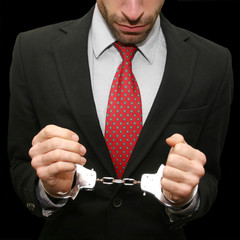 business man in handcuffs - obrazy, fototapety, plakaty