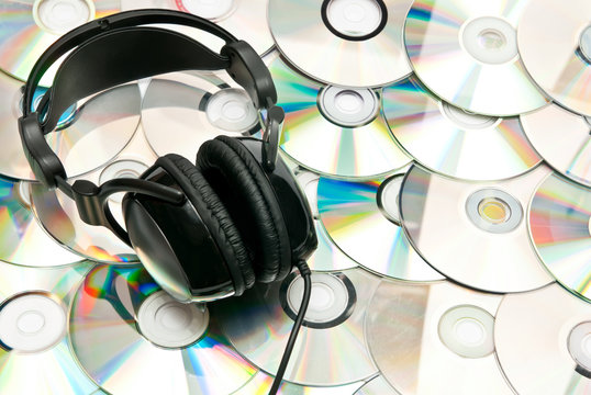 CDs background with headphones