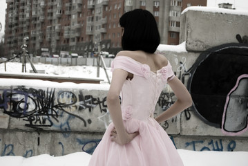 young bride among the street ruins