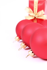Red matt christmas balls and gift-background with text space