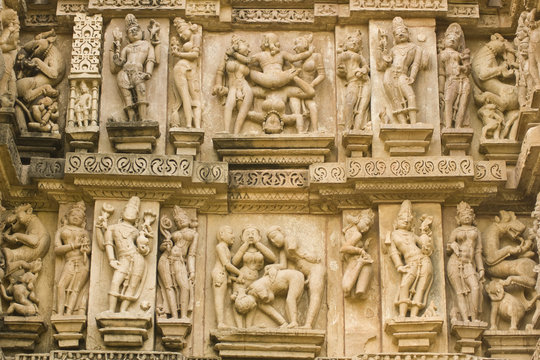 Erotic sculptures on ancient Hindu Temple at Khajuraho, India