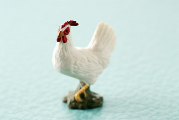 Petit coq jouet en plastique