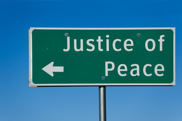 Justice of Peace sign with blue sky background - obrazy, fototapety, plakaty