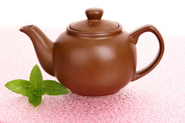 Teapot with green tea with mint
