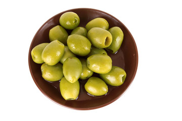 Green olives on the plate  isolated on white