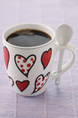 Tasse de café à petits coeurs