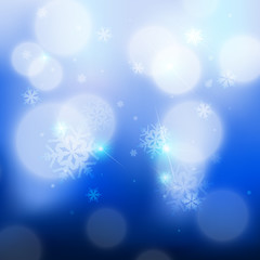 Fototapeta na wymiar blue bokeh snowflakes