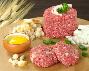 Preparing meatball with ingredients