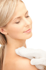 beautiful woman in white mittens