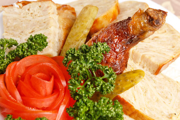 Roasted stuffed chicken with vegetables
