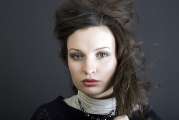 Portrait of a young beautiful brunette close-up