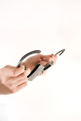 Hands holding handcuffs