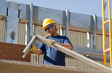 Worker Bending Metal