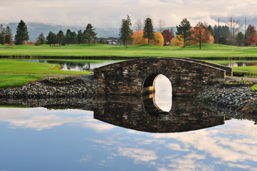 Stone bridge over creek on golf course