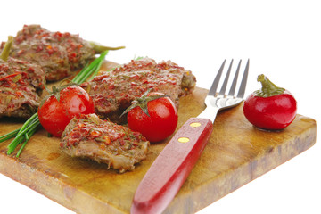 spicy meat on wood