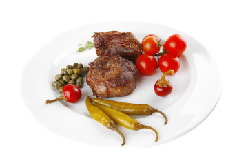 grilled meat medallion with cherry tomatoes
