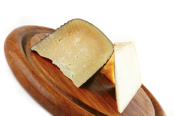 soft delicatessen chesses on wood