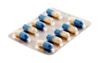 Blue capsules on a white background