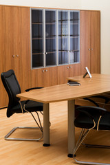 Fototapeta premium Table, chairs and bookcase