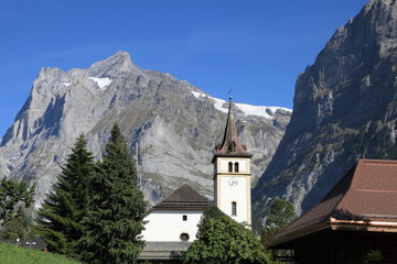 Fototapeta na wymiar Wetterhorn Mountain and church, Jungfrau alps, Switzerland