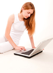 Naklejka premium Teen Girl on Laptop