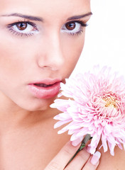 Young beautiful woman with flower