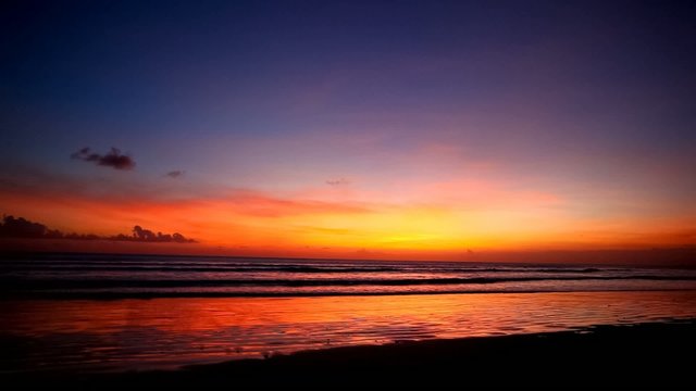 Tropical sunset on the beach. Bali island. Indonesia