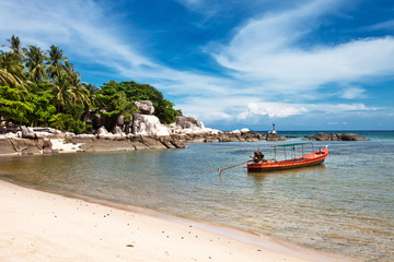 Fototapeta na wymiar Tropical beach under blue sky. Thailand