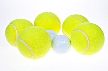 tennis ball, and golf ball close up
