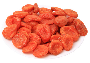 Dried apricots on a white plate