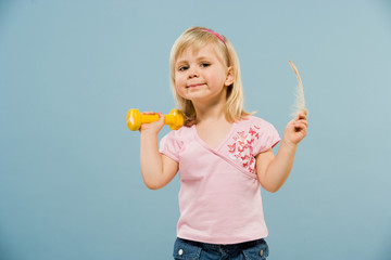 girl with dumbbell and Feather © mbt_studio