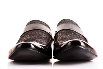 Black shiny man's shoe isolated on white