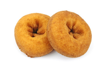 Two cake donuts on white background