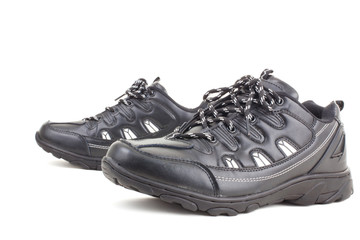 Black leather shoes on a white background