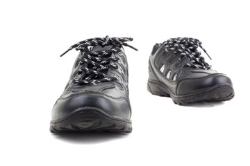 Black leather shoes on a white background