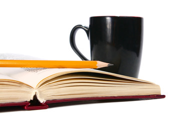 book is a cup and pencil
