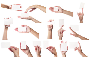 Collection of card blanks in a hand on white background