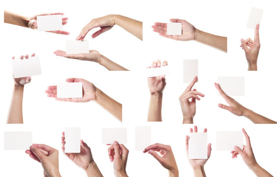 Collection of card blanks in a hand on white background