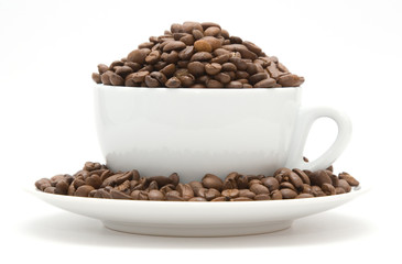 Fototapeta premium Mug filled with coffee beans