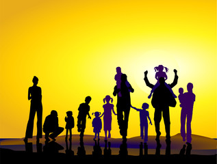 Fototapeta premium Familien vor Sonnenuntergang