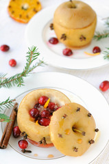 Baked apples stuffed with cranberries.