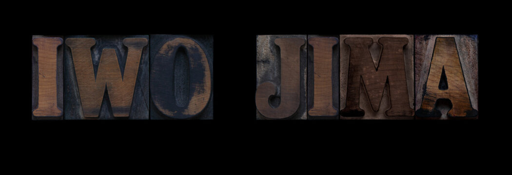 the words Iwo Jima in old letterpress wood type