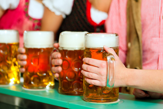People drinking beer in Bavarian pup
