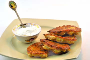 Potato pancakes with sour cream