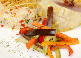 Fried vegetable slices with rice and fish