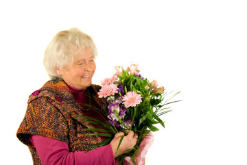 Rentnerin mit Blumenstrauss